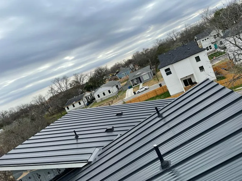 Standing seam metal roof panels with vents for Skylight Repair in Gas City